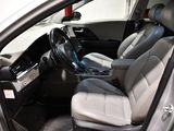 a picture of the inside of a car with the driver ' s seat up