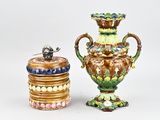 two vases sitting next to each other on a table