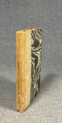 a small book that is sitting on a table