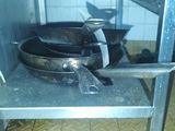 an image of a kitchen area with a stove and pans