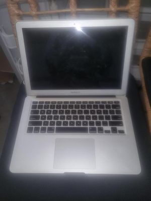 a laptop computer that is sitting on a table