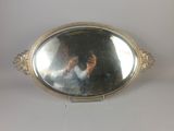 a woman taking a picture of herself in a mirror