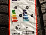 a close up of a tire with a sticker on it