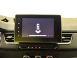 the dashboard of a car with a tablet on the dashboard