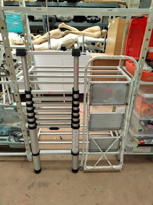a metal rack with many different items in it