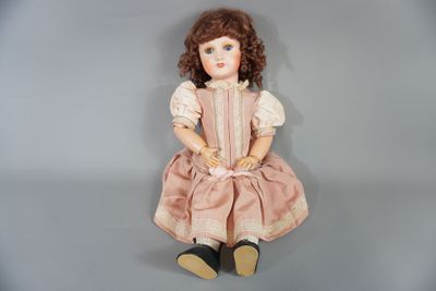 Unis France, poupée tête en porcelaine aux yeux bleu dormeur…