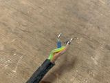 a close up of a piece of electrical wire on a table