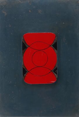 an image of a red and black object on a blue surface