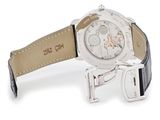 a watch that is sitting on a black leather strap