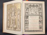 an open book with a picture of jesus on the cross on it