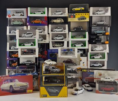 a lot of toy cars that are sitting on a table