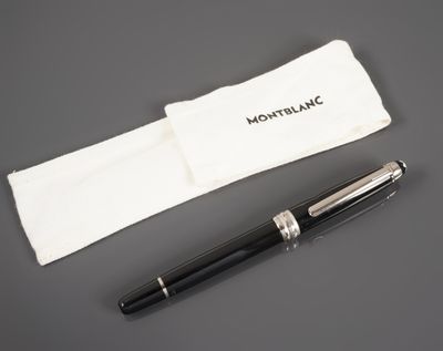 an image of a pen and a pouch on a table