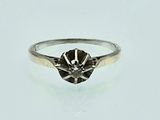 an image of a diamond ring on a white surface