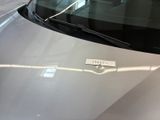 a car that has a sticker on the hood of it