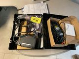 a box of electronics sitting on a table next to a laptop