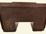a wooden bench with a wooden seat on top of it