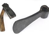two tools that are sitting on a white surface