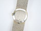 an image of a close up of a wrist watch on a white surface