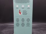 a close up of a box on a table with a black background