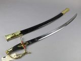pair of japanese samurai sword with black blade and gold plated handle