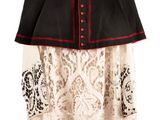 an image of a black and white cape with a red trim