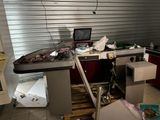 an image of a messy kitchen with a lot of clutter