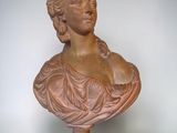 bust of a woman on a pedestal on a white background