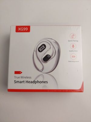 the box of a pair of headphones is open on a white surface