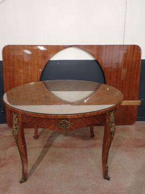 a small table with a mirror on top of it