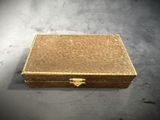 an image of a small wooden box sitting on top of a table