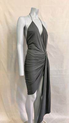 a mannequin wearing a gray dress on a mannequin mannequin mannequin mannequin mannequin mannequin mannequin mann