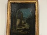 une peinture sur le mur d'une pièce où est accrochée une autre peinture