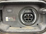 a close up of an electric car charging station