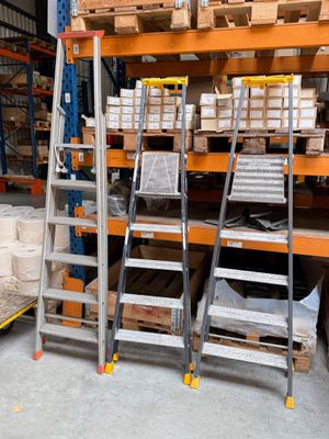 many shelves with boxes and boxes on them in a warehouse