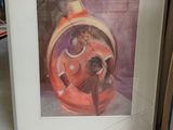 framed painting of a woman in a red dress holding a cat