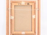 an image of a picture frame hanging on a wall with a string