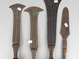 three different types of knifes are displayed on a white surface