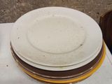 a stack of plates sitting on top of a table