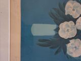 a picture of a painting of white flowers on a blue background