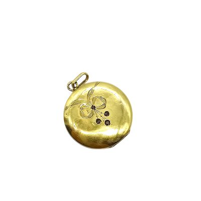 an image of a gold locke with a flower on it