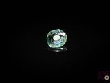 une image représentant un diamant vert sur fond noir
