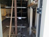 a room with a ladder in it that is being built