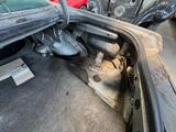 a car that is sitting in the back of the car