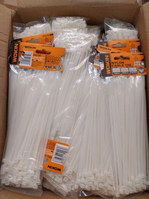 a lot of white plastic straws in a box