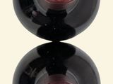 two black balls with red and green numbers on them