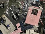a lot of men ' s shirts that are in a box