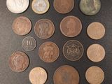 a lot of coins that are on the table
