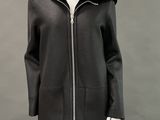 an image of a mannequin dressed in a black coat