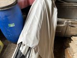 a coat hanging on the back of a truck in a garage