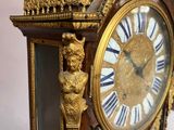 a clock that is sitting on top of a table